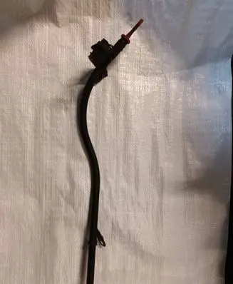 Oil level dip stick