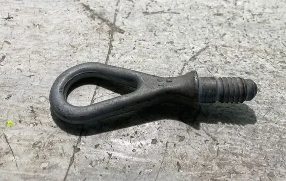 Towing hook eye