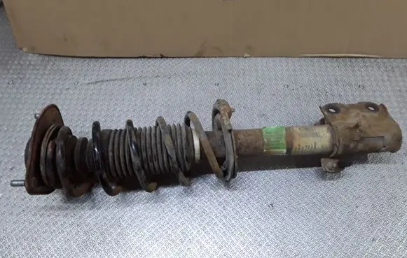 Mitsubishi Colt Front shock absorber with coil spring 4060A094