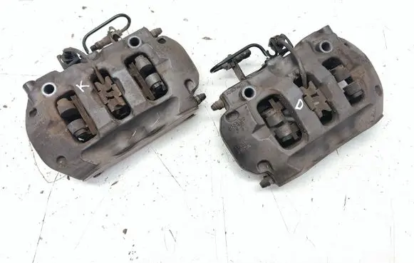Volkswagen Touareg II Rear brake caliper 7P6615404M 7P6615403M