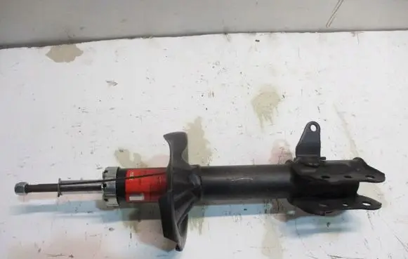 Mazda 323 Front shock absorber/damper JGM1015T
