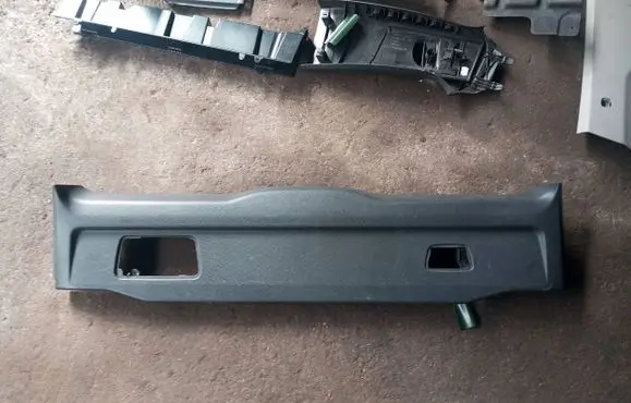 Trunk/boot lower side trim panel