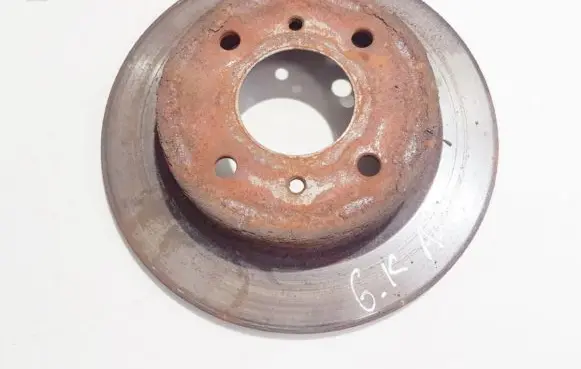 Nissan Almera N16 Rear brake disc neventiliuojamas