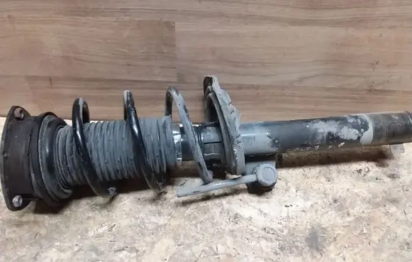 Volkswagen Golf VII Front shock absorber with coil spring 5Q0413023FH
