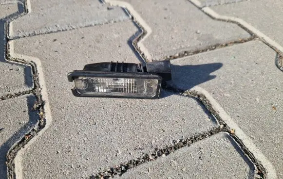 Volkswagen Scirocco Number plate light 1K8943021