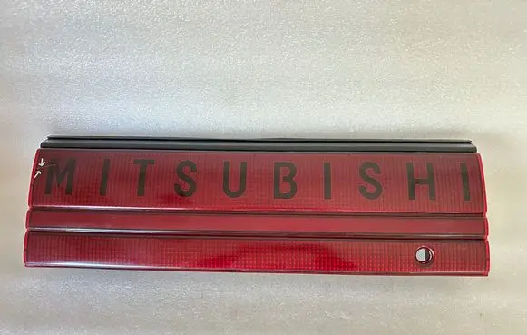 Mitsubishi Eclipse (D21A/D22A/D27A) Tailgate trim MB479056 MB479058 1896001