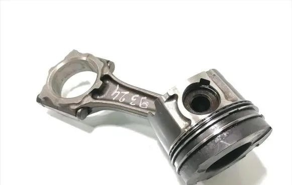 Opel Astra H Piston with connecting rod 