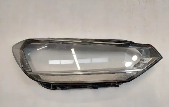 Volkswagen Touran II Headlight lense 1403000060