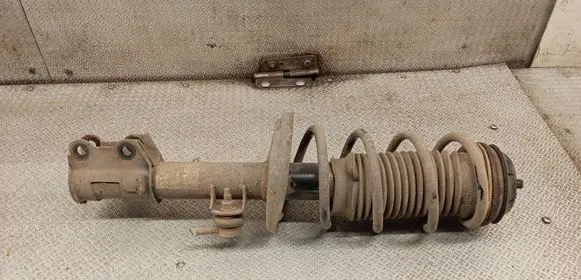 Opel Corsa D Front shock absorber with coil spring 