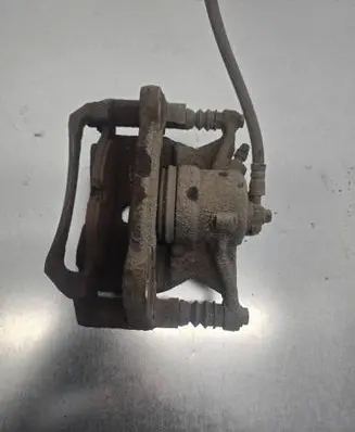 Volkswagen Golf VII Front brake caliper