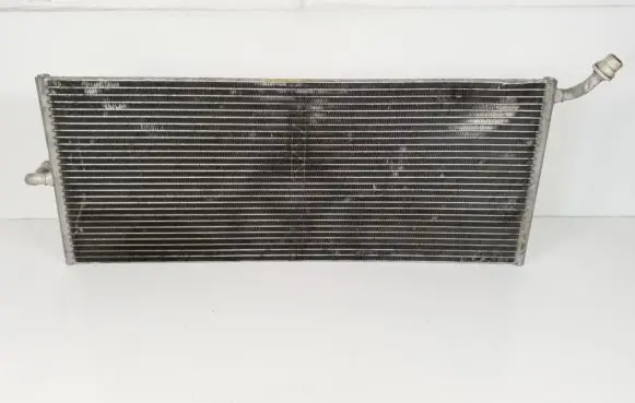 Mercedes-Benz E C207 W207 Coolant radiator A0995002803