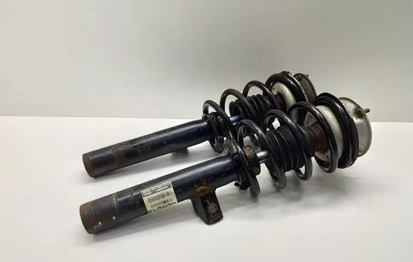 Front shock absorber with coil spring