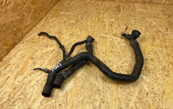Volkswagen Golf VII Engine coolant pipe/hose 5Q0121049AD