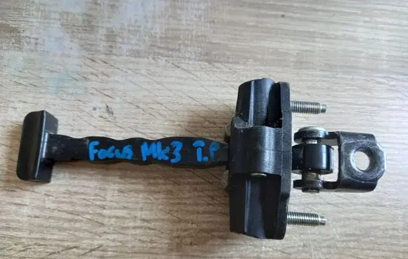 Ford Focus Rear door check strap stopper NE59564