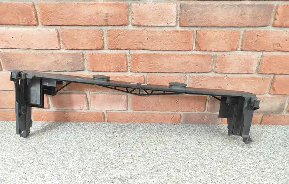 Top upper radiator support slam panel