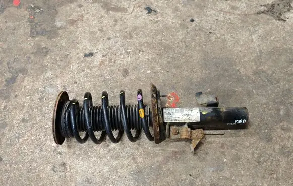 Front shock absorber with coil spring