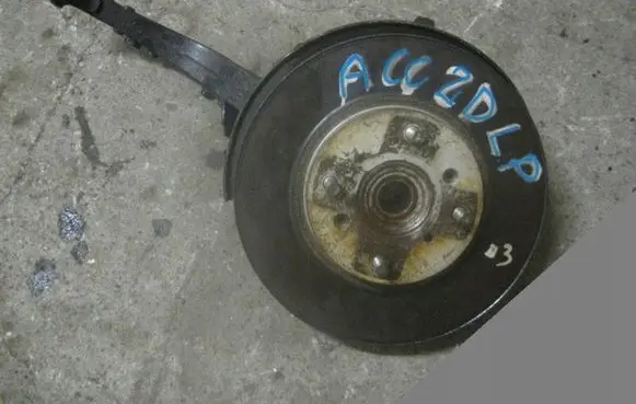 Front wheel hub spindle knuckle