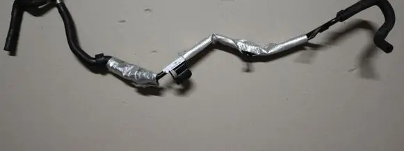 Volkswagen Golf VII Engine coolant pipe/hose 04L121070D
