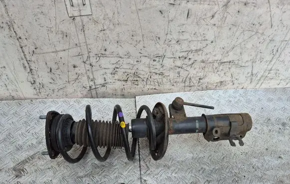 Mazda 3 III Front shock absorber with coil spring