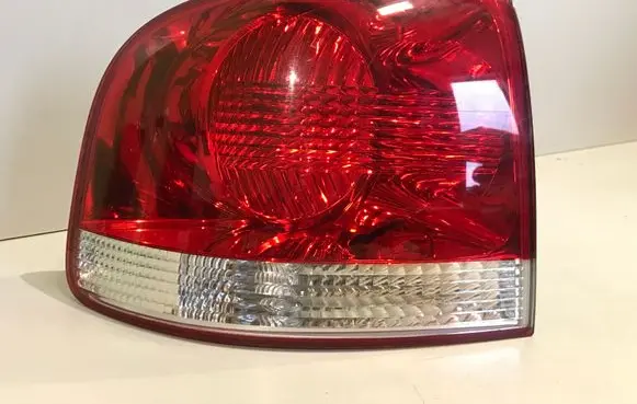 Volkswagen Touareg I Rear/tail lights 28259002 7L6945095K