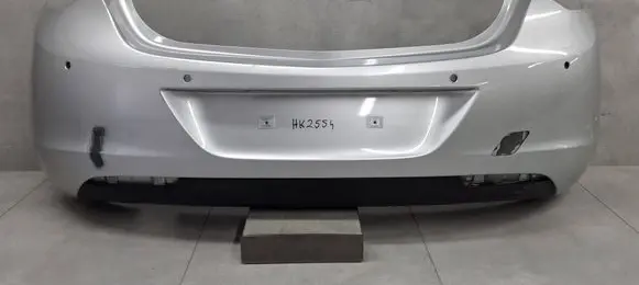 Opel Astra J Rear bumper 13266587