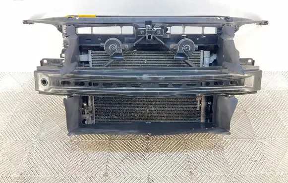 Radiator support slam panel