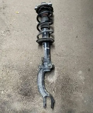 Front shock absorber with coil spring
