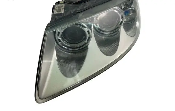 Volkswagen Touareg I Headlight/headlamp 7L6941015BK