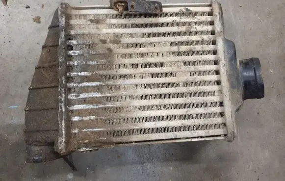 Volkswagen PASSAT B3 Intercooler radiator 357145805B