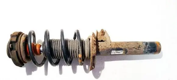 Volkswagen PASSAT B7 Front shock absorber/damper