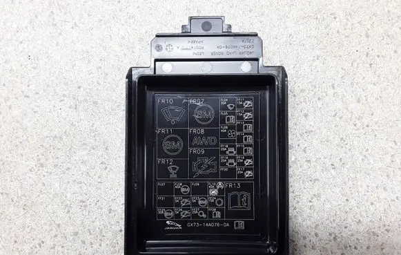 Jaguar F-Pace Fuse box cover GX7314A076DA