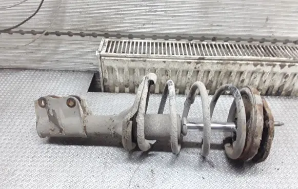 Mitsubishi Space Star Front shock absorber with coil spring