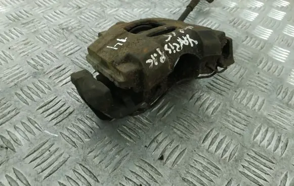 Toyota Yaris Front brake caliper 569