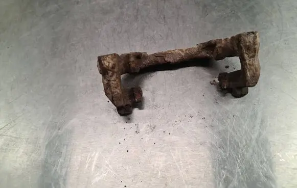 Saab 9-3 Ver2 Brake caliper pad carrier rear 