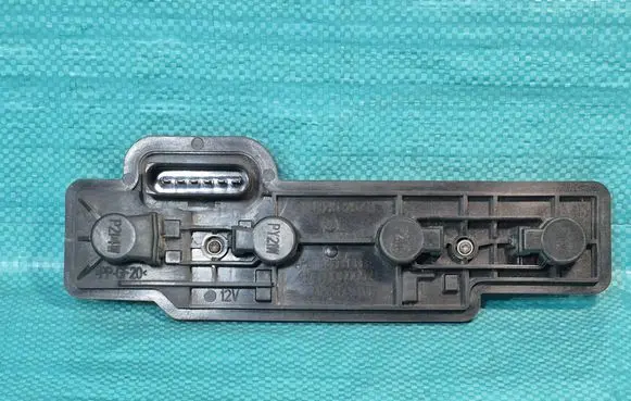 Volkswagen Caddy Tail light bulb cover holder 2K0945257A