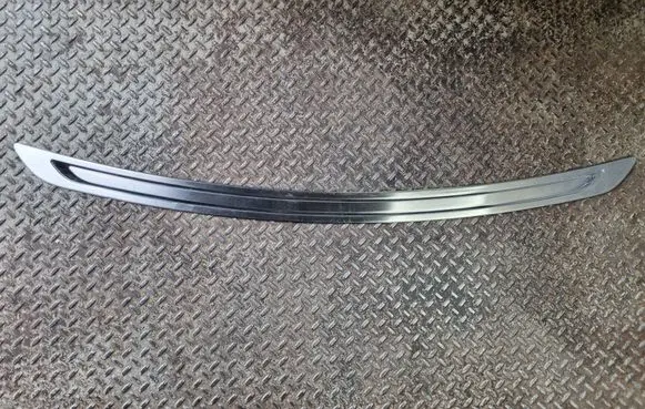 Rear bumper trim bar molding