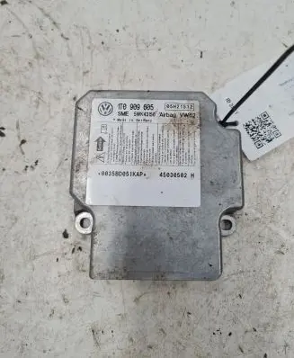 Volkswagen Touran I Airbag control unit/module 1T0909605