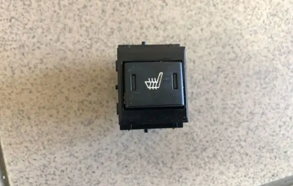 Seat heating switch