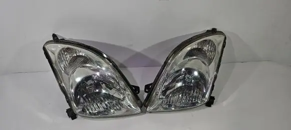 Suzuki Swift I Headlights/headlamps set 12489672348