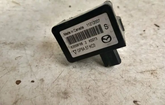 Mazda CX-7 Airbag deployment crash/impact sensor GP9A57KC0 11212007 63558F68