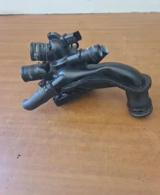 Thermostat/thermostat housing
