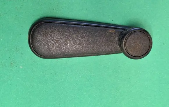 Volkswagen Golf II Front door window winding handle 191837579