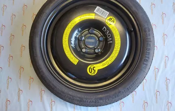 Volkswagen Golf V R18 spare wheel 1K0601027B