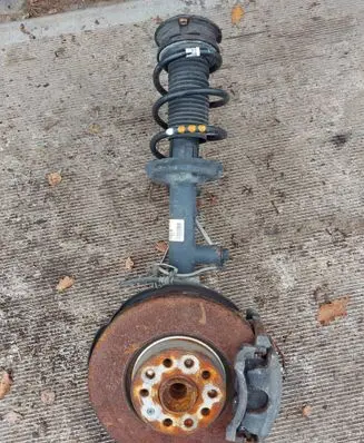 Volkswagen PASSAT B8 Front shock absorber with coil spring 5Q0413032 5Q0407258C