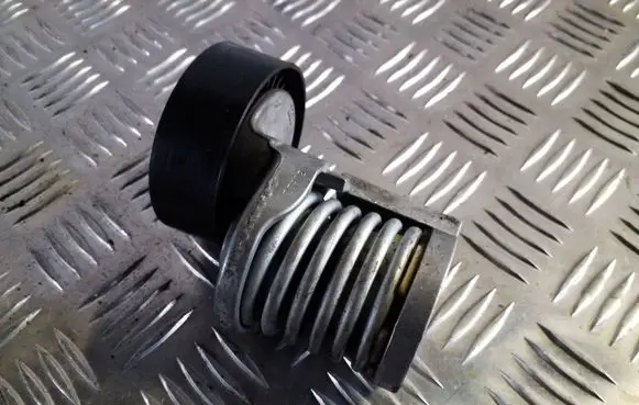 Generator/alternator belt tensioner