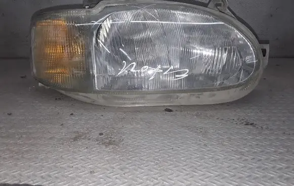 Ford Escort Headlight/headlamp 95AG13W029DD