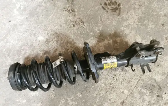 Buick Encore I Front shock absorber with coil spring 95266856
