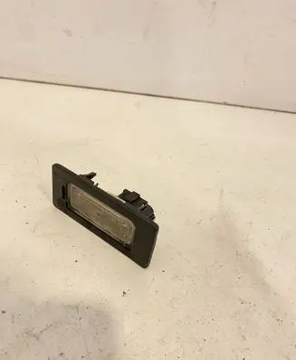 Volkswagen PASSAT B6 Number plate light 8T0943021
