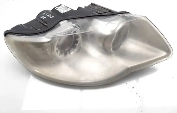 Volkswagen Touareg I Headlight/headlamp 7L6941040A 1LL247032-10