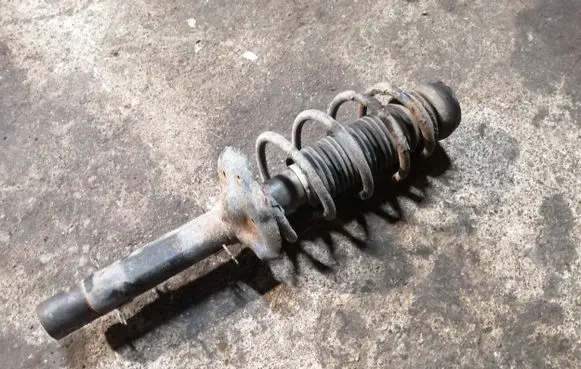 Front shock absorber with coil spring